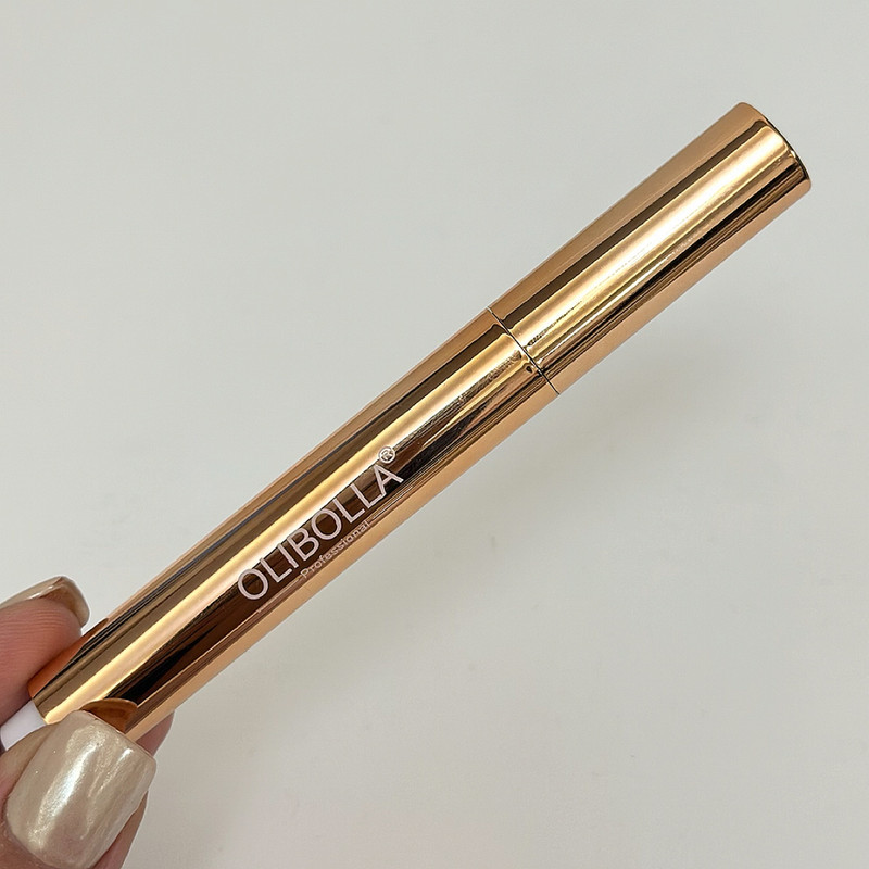 بالم لب اولیبولا مدل shimmer و رنگ رزگلد، مرطوبکننده و آبرسان، مناسب لبهای خشک و حساس، ساختار جامد، طراحی تیوپی